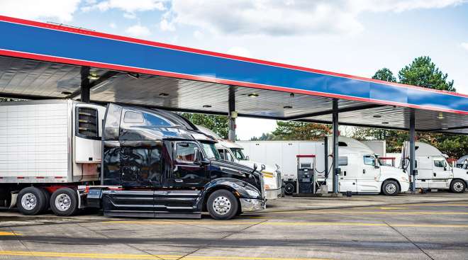 Trucks fueling at a truck stop