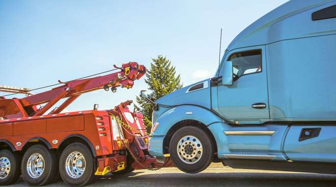 Truck being towed